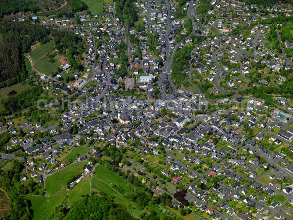 Daaden from above - View of Daaden in the state of Rhineland-Palatinate. The borough and municipiality Daaden is located in the county district of Altenkirchen in the Westerwald forest region and surrounded by fields, meadows and forest. The official tourist resort is located right on the border to the state of North Rhine-Westphalia. The river Daade takes its course through the village