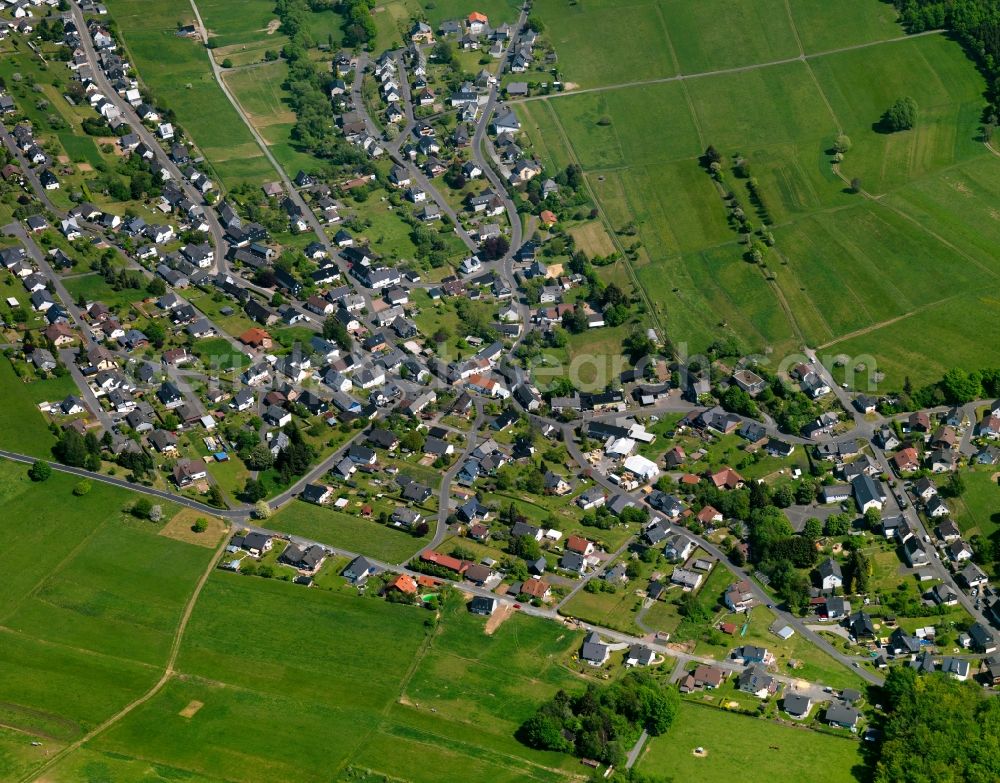 Aerial image Derschen - View of Derschen in the state of Rhineland-Palatinate. The borough and municipiality Derschen is located in the county district of Altenkirchen in the Westerwald forest region and surrounded by fields, meadows and forest. The creek Derscher Bach takes its course through the agricultural village