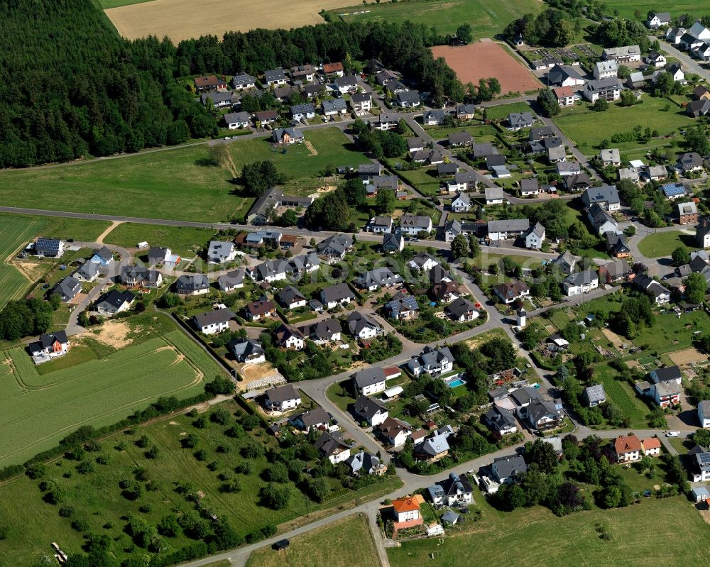 Aerial image Dickenschied - View of Dickenschied in the state of Rhineland-Palatinate. Dickenschied is located in the county district of Rhine-Hunsrueck. The borough and municipiality consists of residential areas and agricultural land and sits on federal highway B421