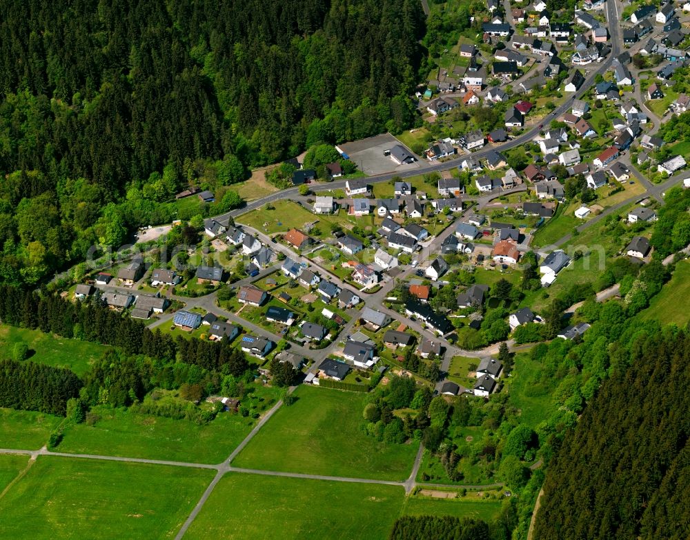 Emmerzhausen from above - View of Emmerzhausen in the state of Rhineland-Palatinate. The borough and municipiality Emmerzhausen is located in the county district of Altenkirchen in the Westerwald forest region and surrounded by fields, meadows and forest