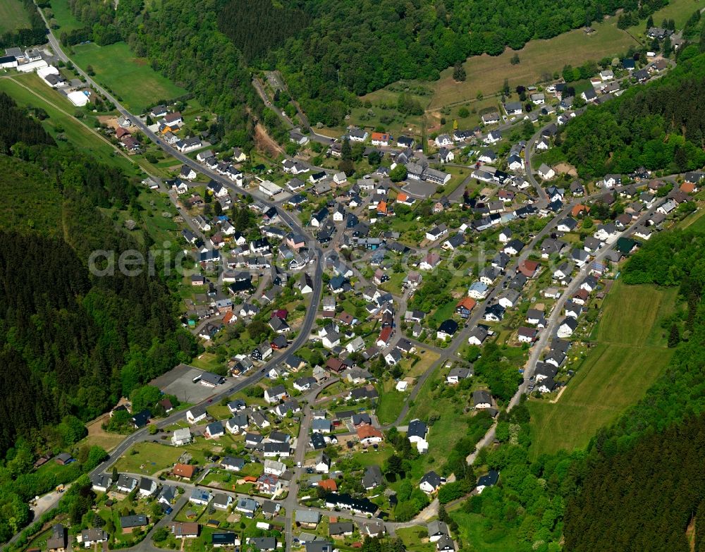 Emmerzhausen from the bird's eye view: View of Emmerzhausen in the state of Rhineland-Palatinate. The borough and municipiality Emmerzhausen is located in the county district of Altenkirchen in the Westerwald forest region and surrounded by fields, meadows and forest