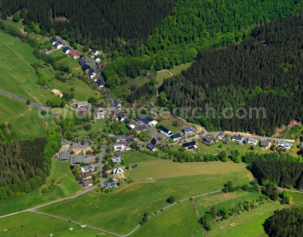 Aerial image Emmerzhausen - View of Emmerzhausen in the state of Rhineland-Palatinate. The borough and municipiality Emmerzhausen is located in the county district of Altenkirchen in the Westerwald forest region and surrounded by fields, meadows and forest