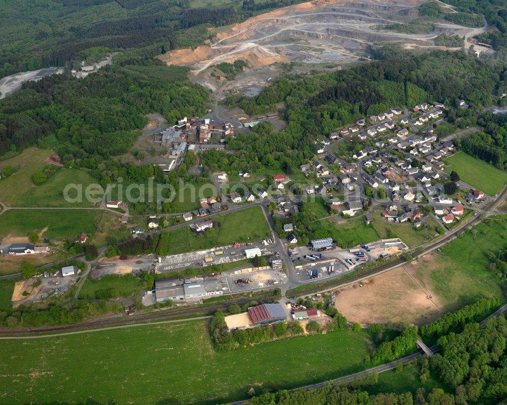 Aerial image Enspel - View of Enspel in the state of Rhineland-Palatinate. The borough and municipiality Enspel is located in the county district of Westerwaldkreis and surrounded by fields, meadows and forest. It is characterised by its location on a slope of the Stoeffel mountain, a basalt mountain