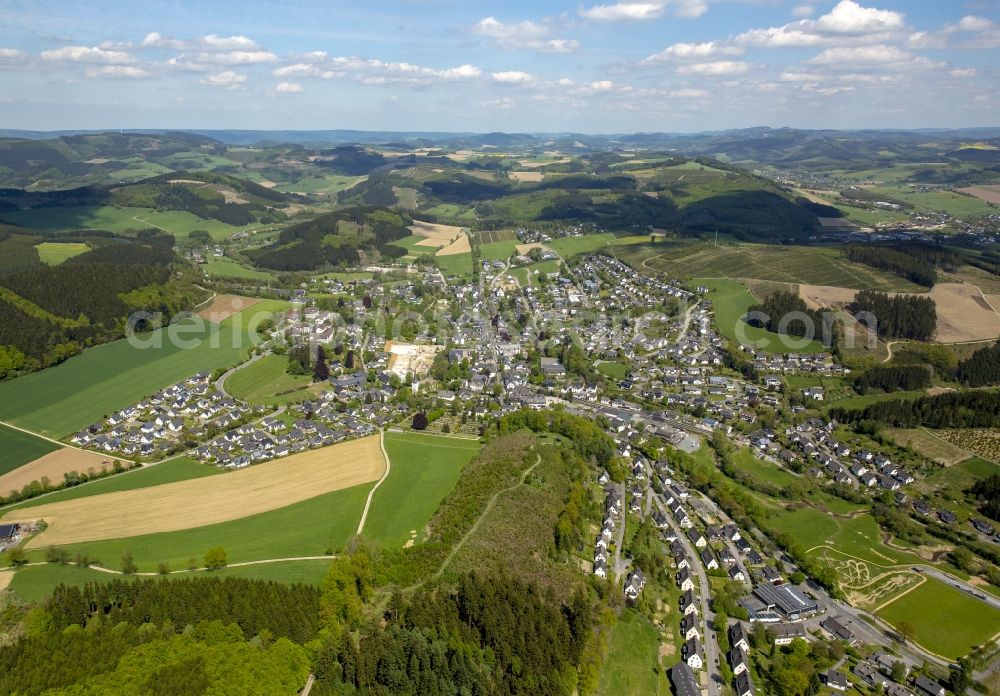 Eslohe (Sauerland) from above - View of Eslohe in the state of North Rhine-Westphalia. Eslohe is located in the county district of Hochsauerland. It is an official spa resort and surrounded by forest, meadows and fields