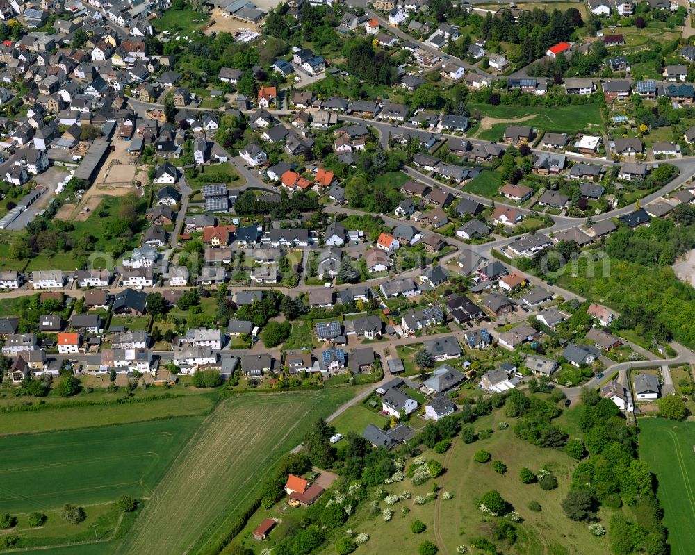 Ettringen from above - View of Ettringen in the state of Rhineland-Palatinate. The borough and municipiality is located in the county district of Mayen-Koblenz and surrounded by hills, forest and fields. It mainly consists of residential areas. Ettringen is know for its volcanic origin and mining facilities