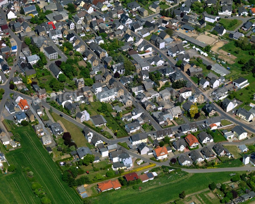 Aerial image Ettringen - View of Ettringen in the state of Rhineland-Palatinate. The borough and municipiality is located in the county district of Mayen-Koblenz and surrounded by hills, forest and fields. It mainly consists of residential areas. Ettringen is know for its volcanic origin and mining facilities