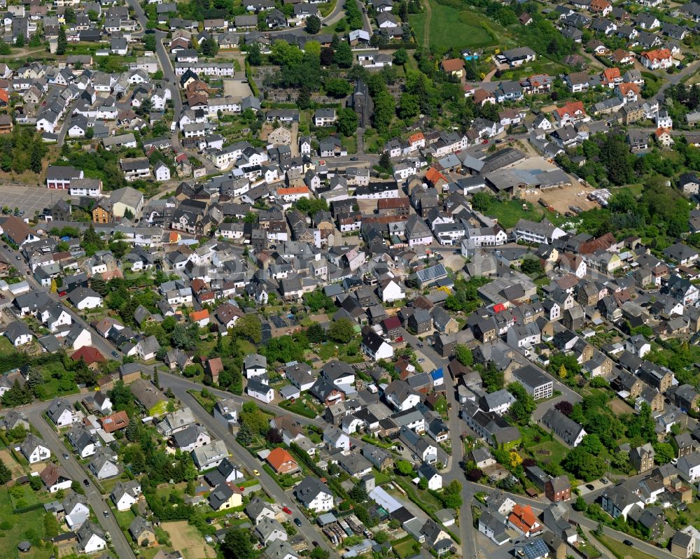 Aerial photograph Ettringen - View of Ettringen in the state of Rhineland-Palatinate. The borough and municipiality is located in the county district of Mayen-Koblenz and surrounded by hills, forest and fields. It mainly consists of residential areas. Ettringen is know for its volcanic origin and mining facilities