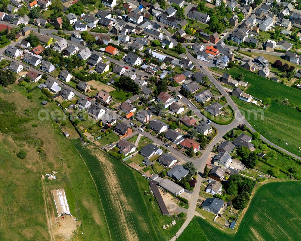 Ettringen from above - View of Ettringen in the state of Rhineland-Palatinate. The borough and municipiality is located in the county district of Mayen-Koblenz and surrounded by hills, forest and fields. It mainly consists of residential areas. Ettringen is know for its volcanic origin and mining facilities