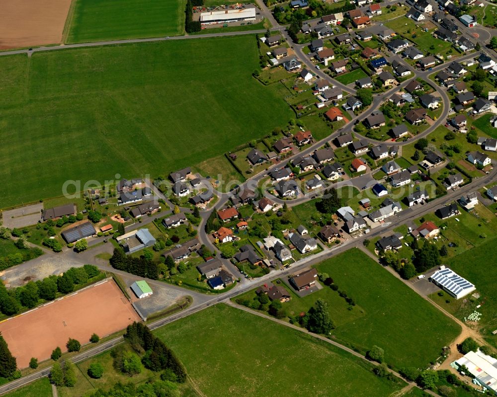 Aerial photograph Fehl-Ritzhausen - View of the borough of Fehl-Ritzhausen in the state of Rhineland-Palatinate. The borough is located in the county district and region of Westerwald. The residential village is surrounded by fields and meadows