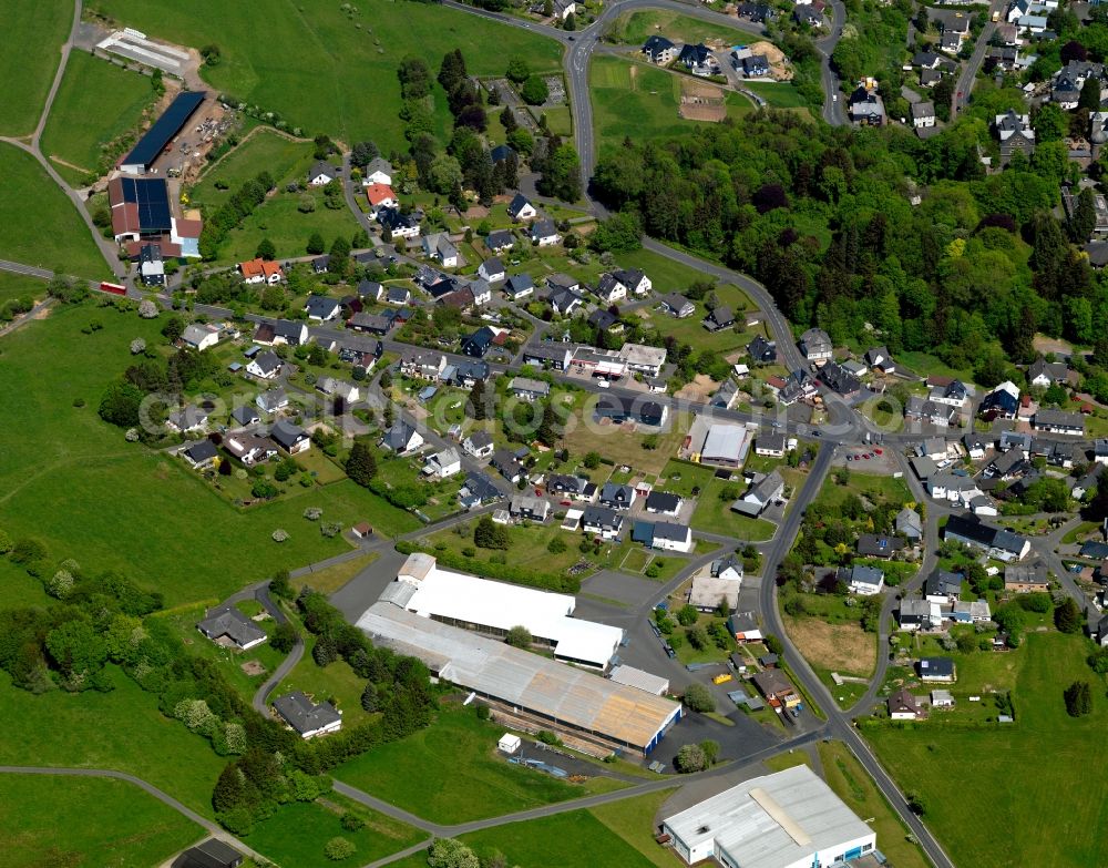 Aerial image Friedewald - View of Friedewald in the state of Rhineland-Palatinate. The borough and municipiality Friedewald is located in the county district of Altenkirchen in the Westerwald forest region and surrounded by fields, meadows and forest. The former mining town is today known for its castle