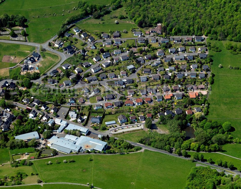 Aerial photograph Friedewald - View of Friedewald in the state of Rhineland-Palatinate. The borough and municipiality Friedewald is located in the county district of Altenkirchen in the Westerwald forest region and surrounded by fields, meadows and forest. The former mining town is today known for its castle