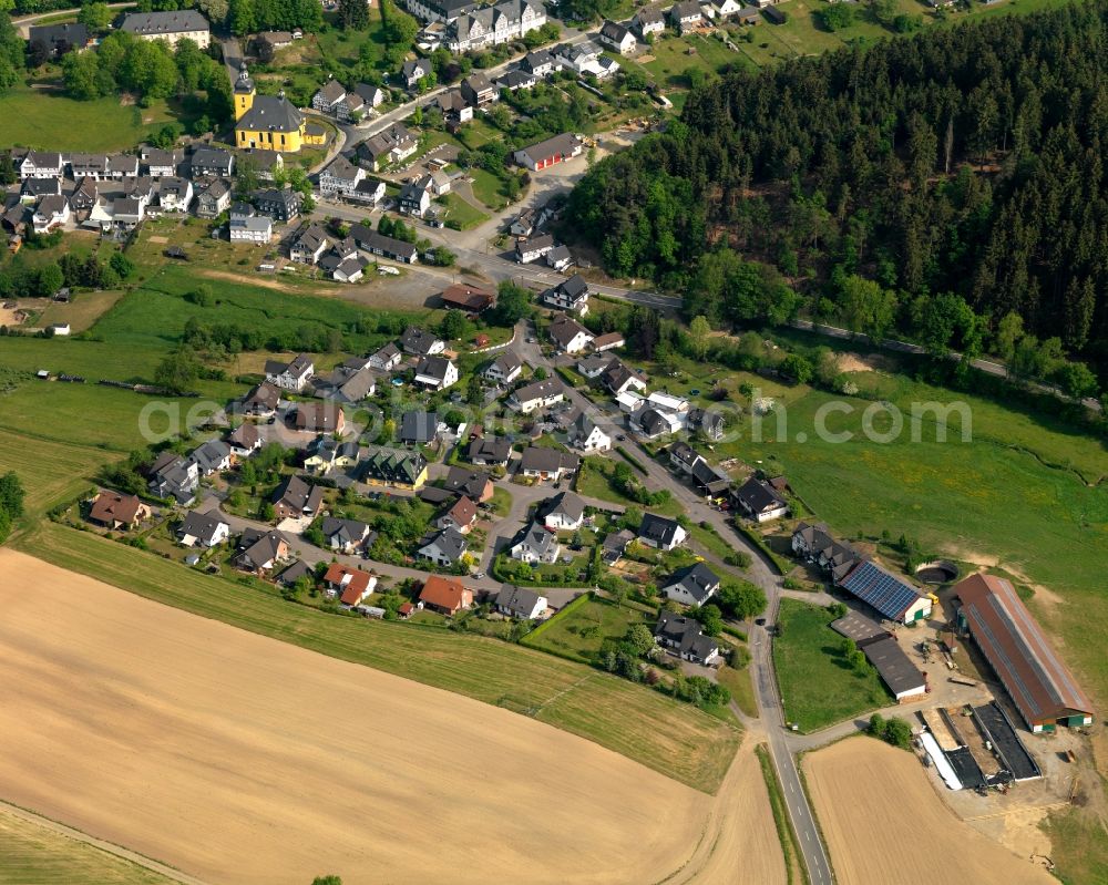 Aerial image Friesenhagen - View of Friesenhagen in the state of Rhineland-Palatinate. Friesenhagen is an official tourist resort. It is surrounded by hills, fields and wooded areas