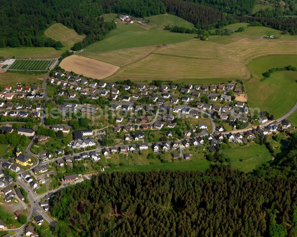 Aerial photograph Friesenhagen - View of Friesenhagen in the state of Rhineland-Palatinate. Friesenhagen is an official tourist resort. It is surrounded by hills, fields and wooded areas