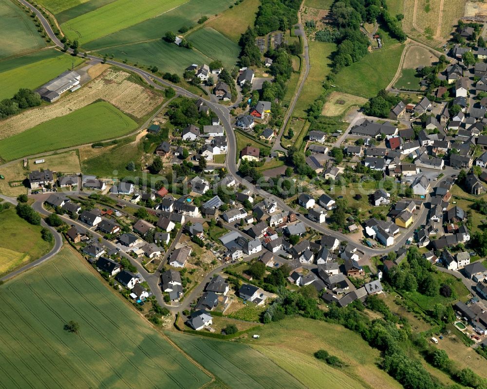 Aerial photograph Gamlen - View of Gamlen in the state of Rhineland-Palatinate. The borough and municipiality is located in the county district of Cochem-Zell on the edge of the Eifel Region. Gamlen is surrounded by agricultural land, meadows and forest and is located on both sides of the Brohlbach creek