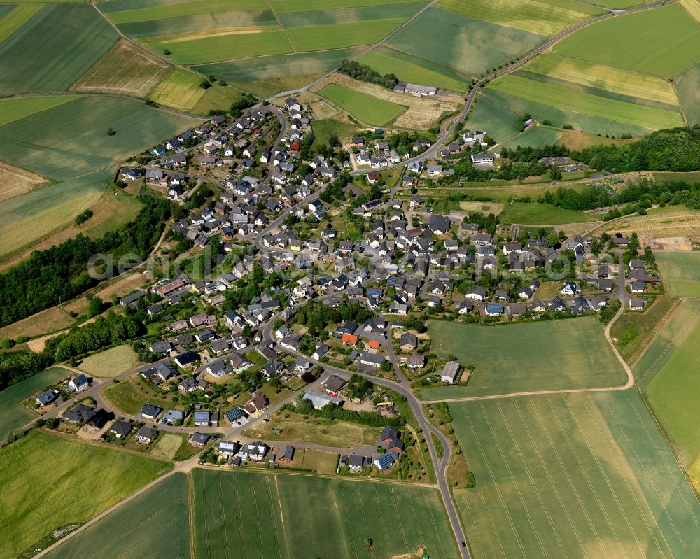 Aerial photograph Gamlen - View of Gamlen in the state of Rhineland-Palatinate. The borough and municipiality is located in the county district of Cochem-Zell on the edge of the Eifel Region. Gamlen is surrounded by agricultural land, meadows and forest and is located on both sides of the Brohlbach creek