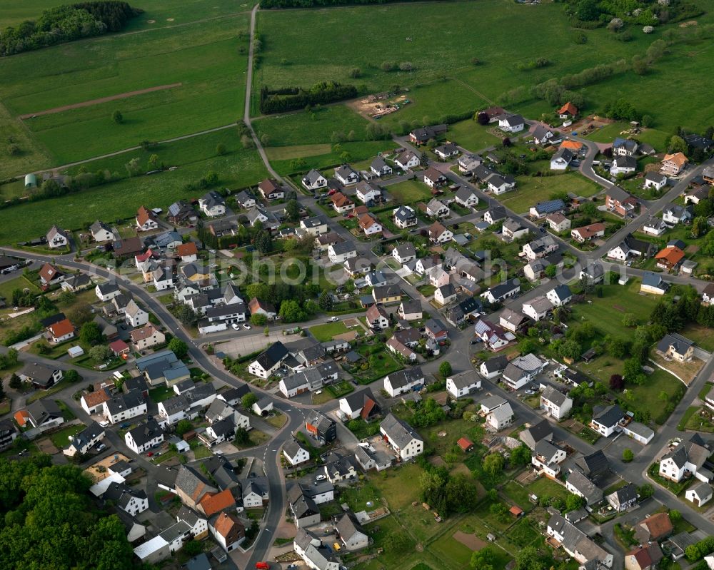 Girkenroth from the bird's eye view: View of Girkenroth in the state of Rhineland-Palatinate. The borough and municipiality is located in the county district of Westerwaldkreis on the edge of the Watzenhahn forest. Hundsdorf is surrounded by agricultural land, hills and meadows