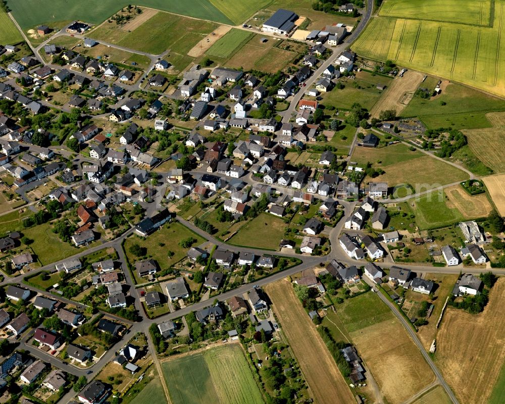 Greimersburg from the bird's eye view: View of Greimersburg in the state of Rhineland-Palatinate. The borough and municipiality is located in the county district of Cochem-Zell in the East Eifel region. Greimersburg is surrounded by agricultural land and meadows and includes several small hamlets and settlements