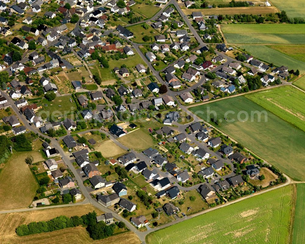 Aerial photograph Greimersburg - View of Greimersburg in the state of Rhineland-Palatinate. The borough and municipiality is located in the county district of Cochem-Zell in the East Eifel region. Greimersburg is surrounded by agricultural land and meadows and includes several small hamlets and settlements