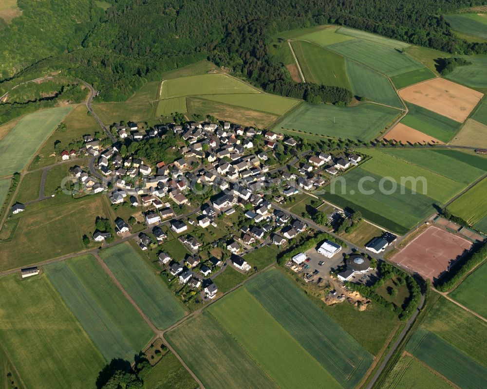 Gutenacker from above - View of the borough of Gutenacker in the state of Rhineland-Palatinate. The borough and municipiality is located in the county district of Rhine-Lahn. The agricultural village consists of residential buildings and areas, sits in the Western Taunus mountain range and is surrounded by meadows and fields