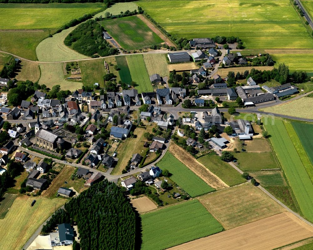 Hambuch from above - View of Hambuch in the state of Rhineland-Palatinate. The borough and municipiality is located in the county district of Cochem-Zell on the edge of the Eifel Region. Hambuch is surrounded by agricultural land and meadows and is located close to the federal motorway A48