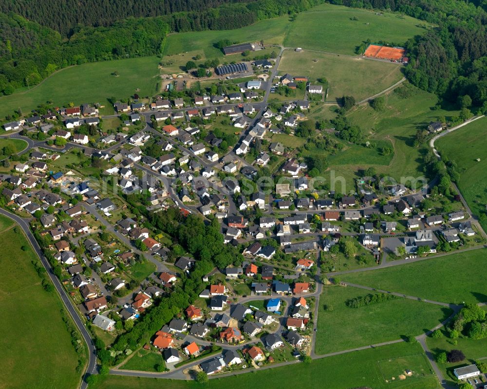 Hübingen from above - View of the borough of Huebingen in the state of Rhineland-Palatinate. The borough is located in the county district and region of Westerwald. The residential village is surrounded by fields and meadows. It sits in the Nature Park of Nassau