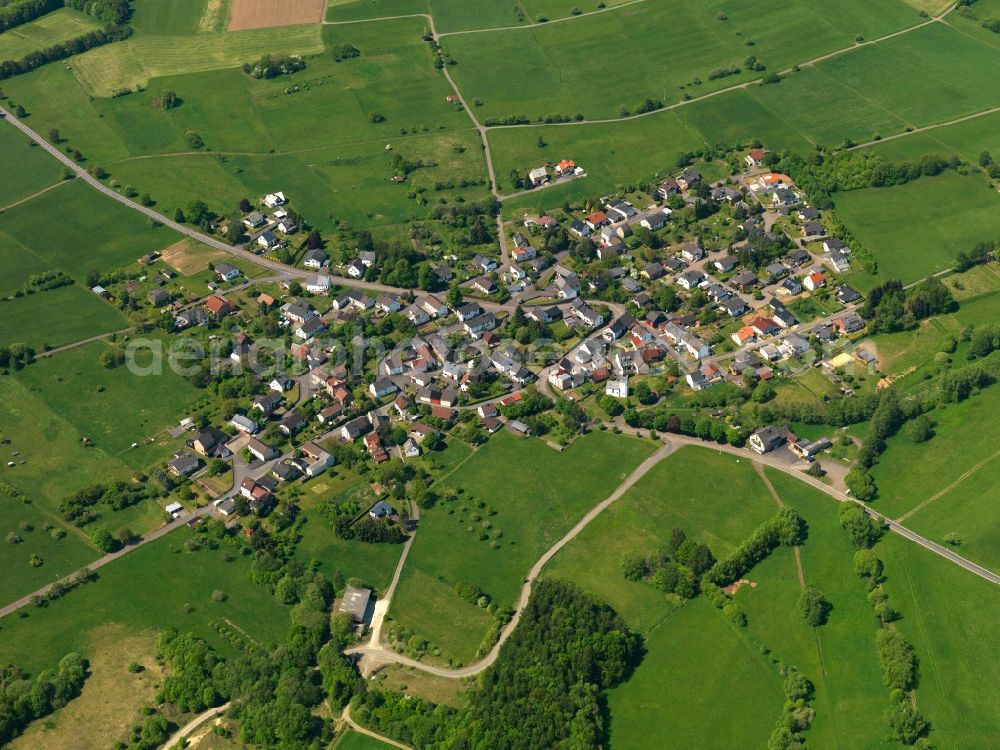 Aerial image Hüblingen - View of the borough of Hueblingen in the state of Rhineland-Palatinate. The borough is located in the county district and region of Westerwald. The residential village is surrounded by fields and meadows