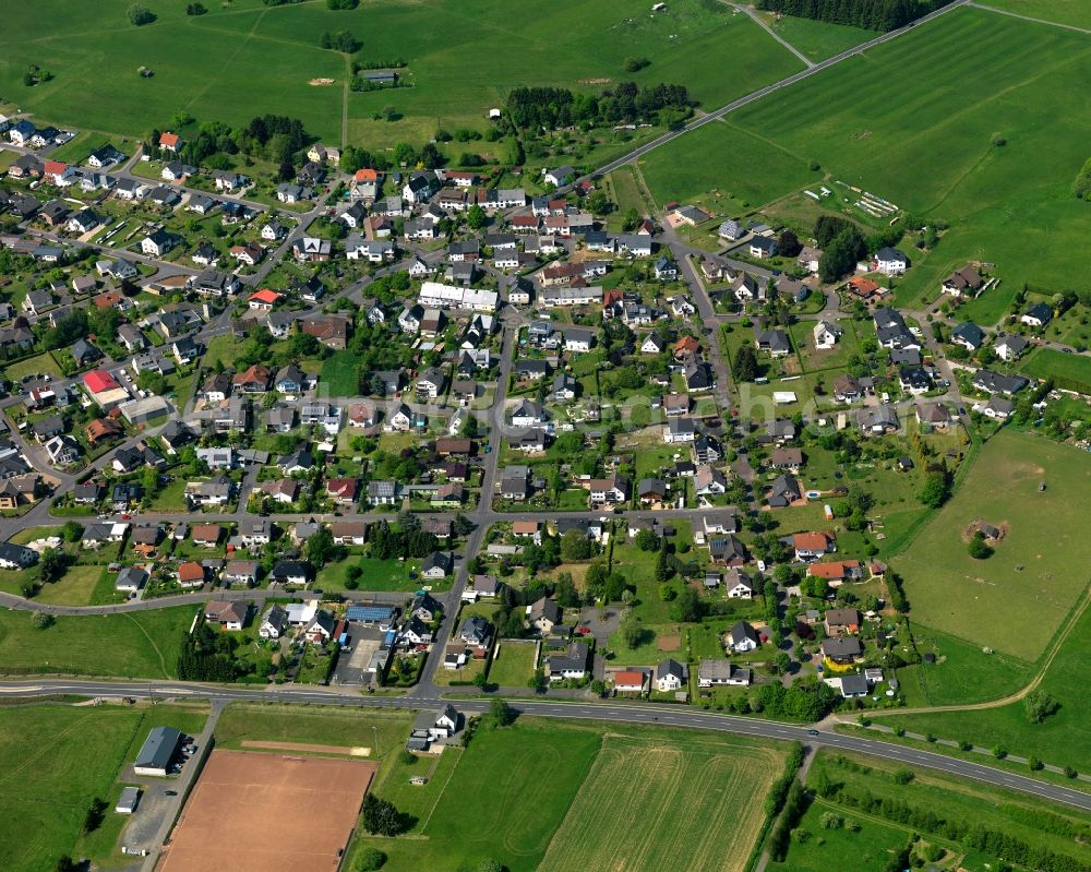 Aerial photograph Hellenhahn-Schellenberg - View of the borough of Hellenhahn-Schellenberg in the state of Rhineland-Palatinate. The borough is located in the county district and region of Westerwald. The residential village is surrounded by fields and meadows. It sits right on federal highway B255