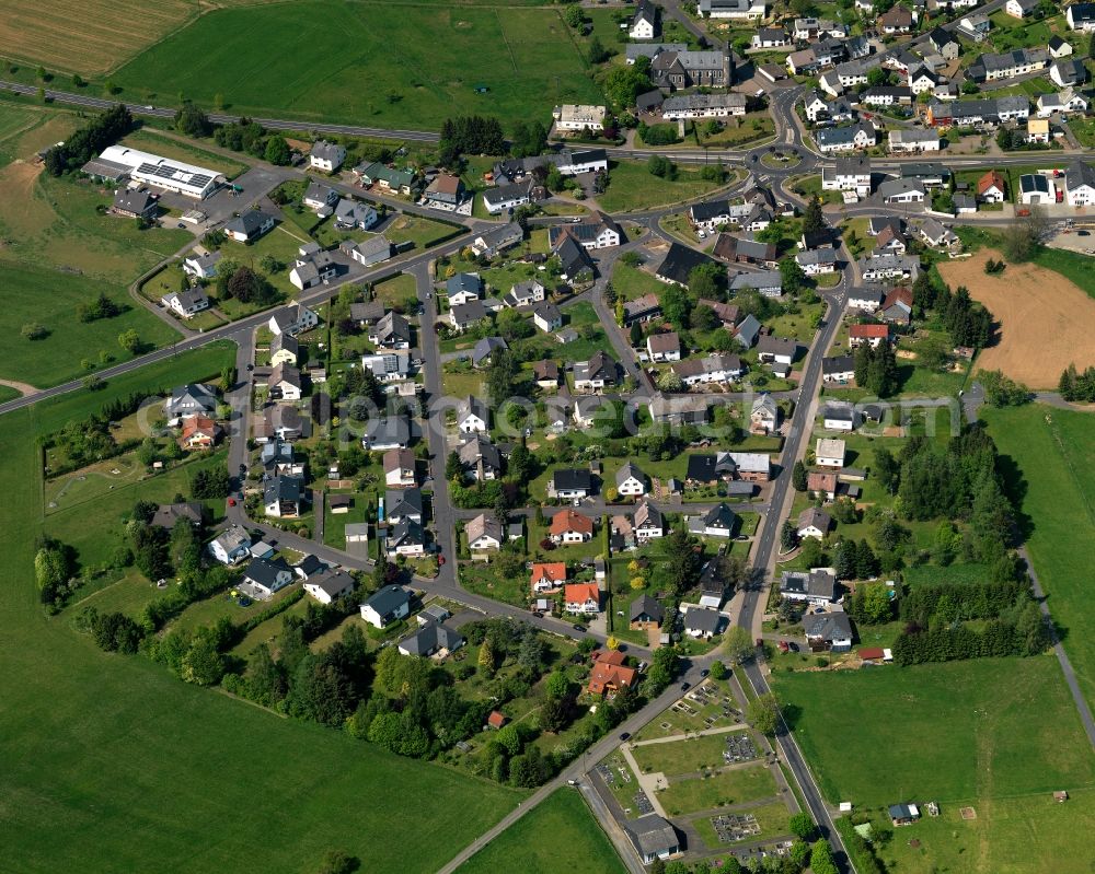 Hellenhahn-Schellenberg from above - View of the borough of Hellenhahn-Schellenberg in the state of Rhineland-Palatinate. The borough is located in the county district and region of Westerwald. The residential village is surrounded by fields and meadows. It sits right on federal highway B255