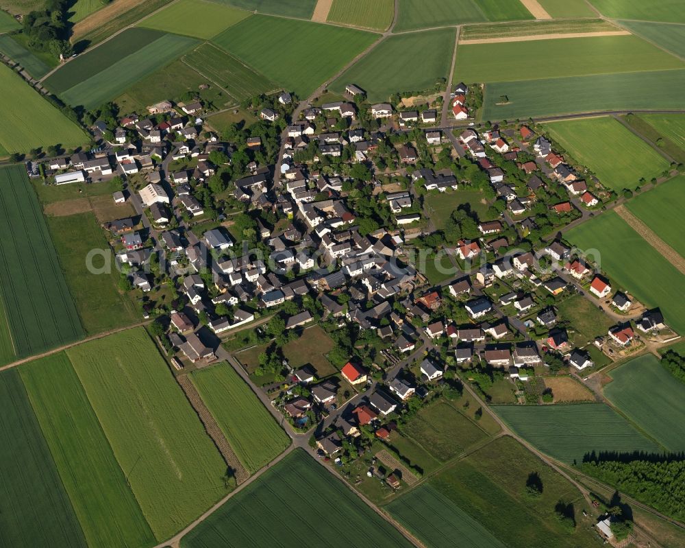 Aerial image Herold - View of the borough of Herold in the state of Rhineland-Palatinate. The borough and municipiality is located in the county district of Rhine-Lahn. The agricultural village consists of residential buildings and areas, sits in the Einrich region and is surrounded by meadows and fields