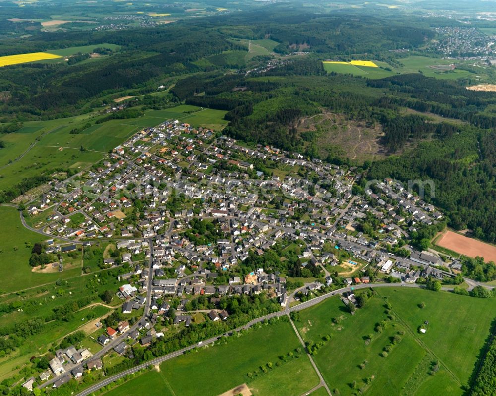 Aerial image Hilgert - View of Hilgert in the state of Rhineland-Palatinate. The borough and municipiality is located in the county district of Westerwaldkreis in the low mountain range of Westerwald - the so called Kannenbaeckerland. Hilgert is surrounded by agricultural land and meadows