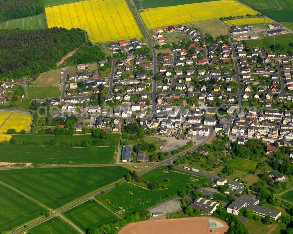 Holzappel from above - View of the borough of Holzappel in the state of Rhineland-Palatinate. The borough is located in the county district of Rhein-Lahn-Kreis. The residential village is surrounded by rapeseed fields and meadows. It sits in the Nature Park of Nassau and is an official tourist resort