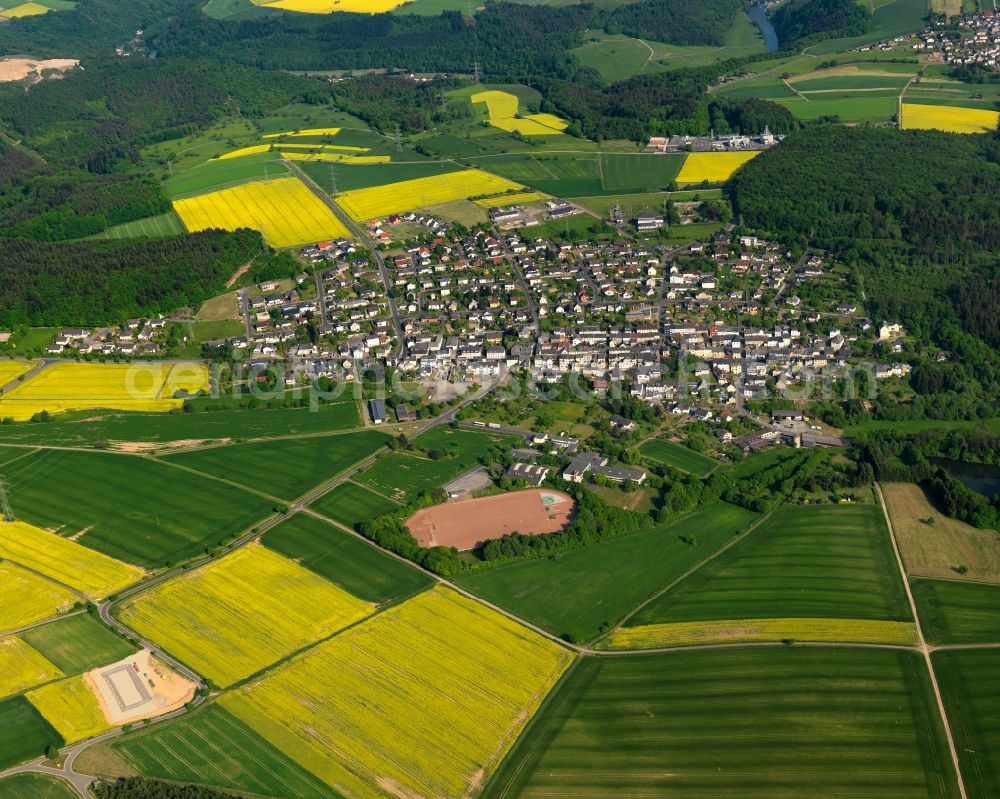 Holzappel from the bird's eye view: View of the borough of Holzappel in the state of Rhineland-Palatinate. The borough is located in the county district of Rhein-Lahn-Kreis. The residential village is surrounded by rapeseed fields and meadows. It sits in the Nature Park of Nassau and is an official tourist resort