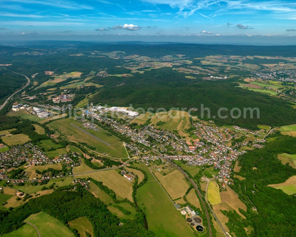 Hoppstädten from the bird's eye view: View of the borough and municipiality of Hoppstaedten in the state of Rhineland-Palatinate. Hoppstaedten is located in the county district of Kusel, in the West Palatinate region and is surrounded by agricultural land, hills and forest