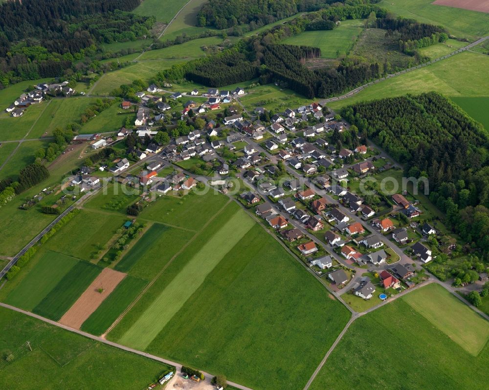 Aerial image Härtlingen - View of the borough of Haertlingen in the state of Rhineland-Palatinate. The borough and municipiality is located in the county district of Westerwaldkreis in the valley of Elbbach creek. Haertlingen is surrounded by agricultural land, hills and meadows and includes several hamlets