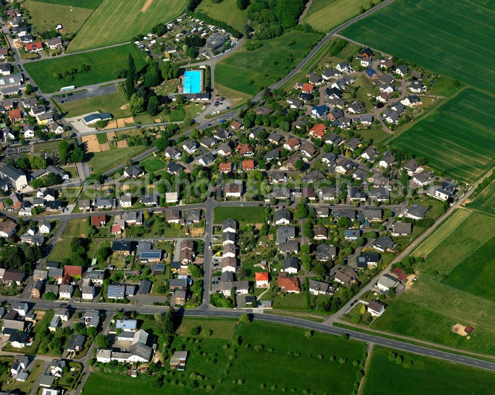 Hundsangen from above - View of Hundsangen in the state of Rhineland-Palatinate. The borough and municipiality is located in the county district of Westerwaldkreis on the border to the state of Hesse. Hundsangen is surrounded by agricultural land and meadows and is located on the federal road B8