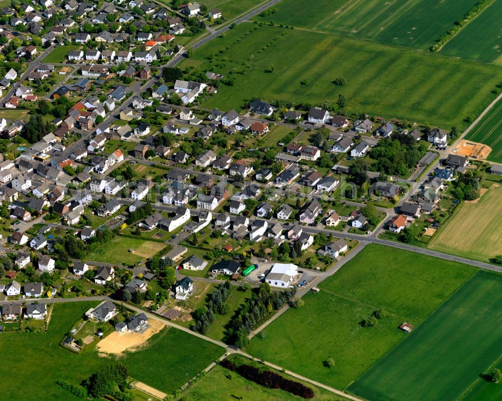 Hundsangen from above - View of Hundsangen in the state of Rhineland-Palatinate. The borough and municipiality is located in the county district of Westerwaldkreis on the border to the state of Hesse. Hundsangen is surrounded by agricultural land and meadows and is located on the federal road B8