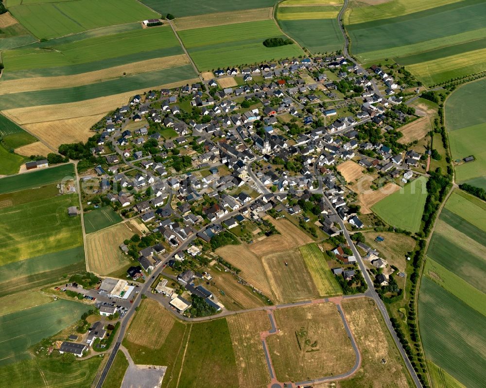 Aerial image Illerich - View of Illerich in the state of Rhineland-Palatinate. The borough and municipiality is located in the county district of Cochem-Zell on the edge of the Eifel Region. Illerich is surrounded by agricultural land and meadows and includes the hamlets of Michelshof, Rosenhof and Waldhof