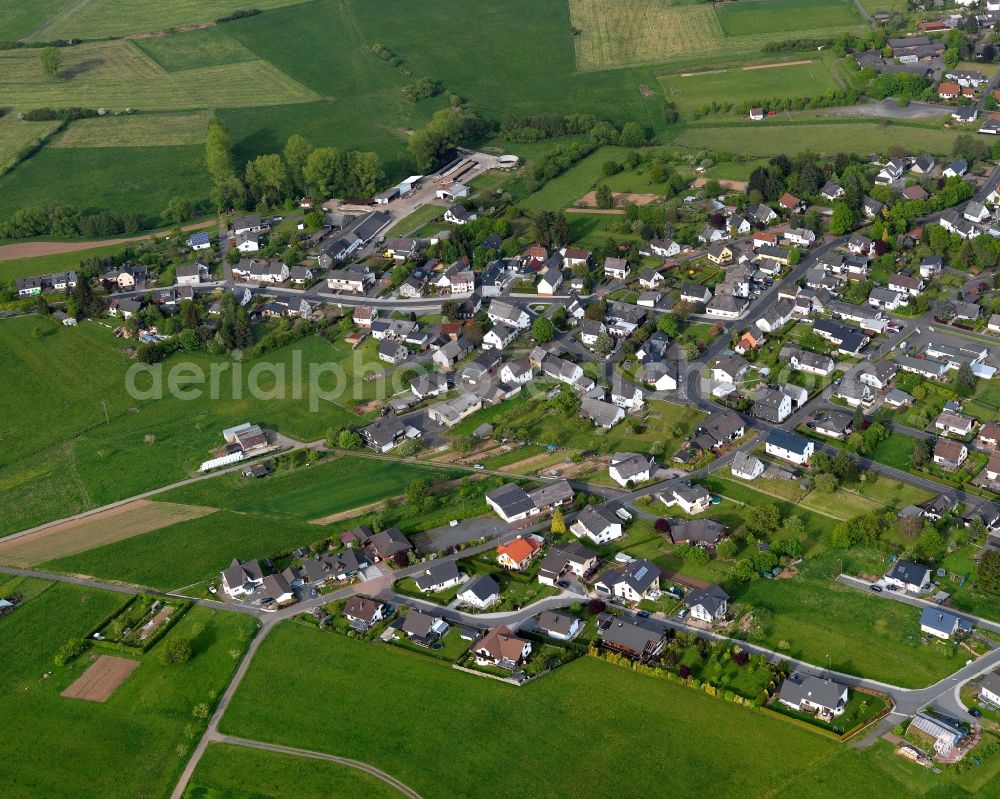 Kaden from the bird's eye view: View of Kaden in the state of Rhineland-Palatinate. The borough and municipiality is located in the county district of Westerwaldkreis and is a rural residential borough. Kaden is surrounded by agricultural land, hills and meadows and located in the valley of creek Elbbach