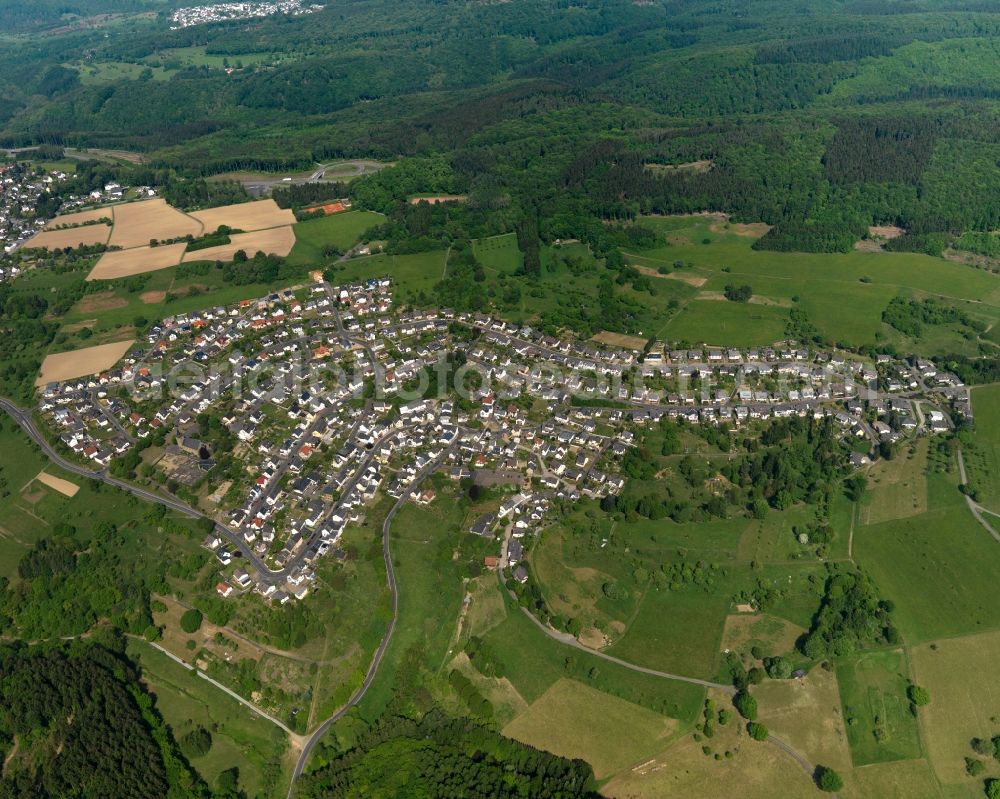 Kadenbach from the bird's eye view: View of the borough of Kadenbach in the state of Rhineland-Palatinate. The borough and municipiality is located in the county district and region of Westerwald. The agricultural village consists of residential buildings and areas and is surrounded by meadows and fields