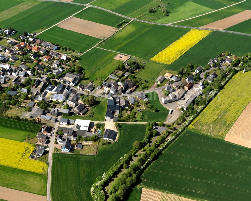 Aerial image Kerben - View of Kerben in the state of Rhineland-Palatinate. The agricultural borough and municipiality is located in the county district of Mayen-Koblenz, in the Niedermaifelder Senke region and the South of the federal motorway A48, and is surrounded by meadows and rapeseed fields