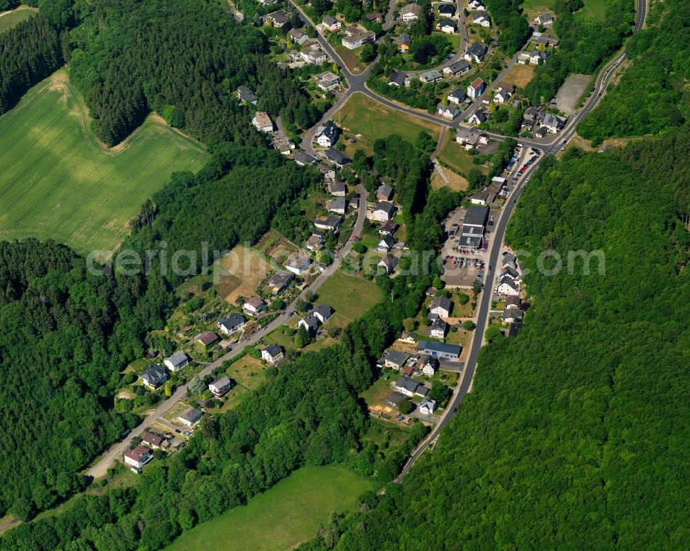 Aerial image Kirschweiler - View of Kirschweiler in the state of Rhineland-Palatinate. The borough and municipiality is an official tourist resort and located in the county district of Birkenfeld, in the Hunsrueck region. It is surrounded by agricultural land, meadows and forest and consists of several hamlets and residential areas