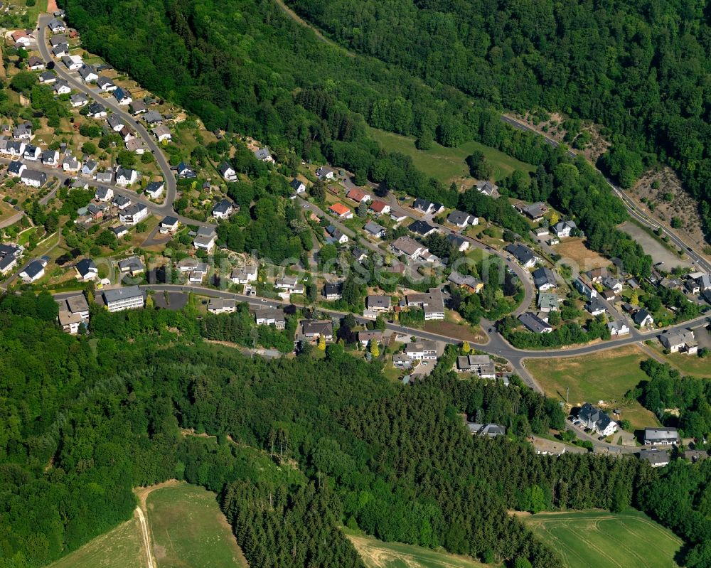 Aerial photograph Kirschweiler - View of Kirschweiler in the state of Rhineland-Palatinate. The borough and municipiality is an official tourist resort and located in the county district of Birkenfeld, in the Hunsrueck region. It is surrounded by agricultural land, meadows and forest and consists of several hamlets and residential areas