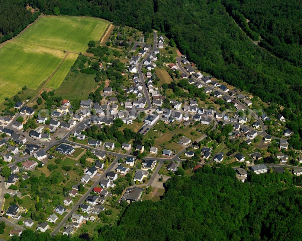 Kirschweiler from above - View of Kirschweiler in the state of Rhineland-Palatinate. The borough and municipiality is an official tourist resort and located in the county district of Birkenfeld, in the Hunsrueck region. It is surrounded by agricultural land, meadows and forest and consists of several hamlets and residential areas