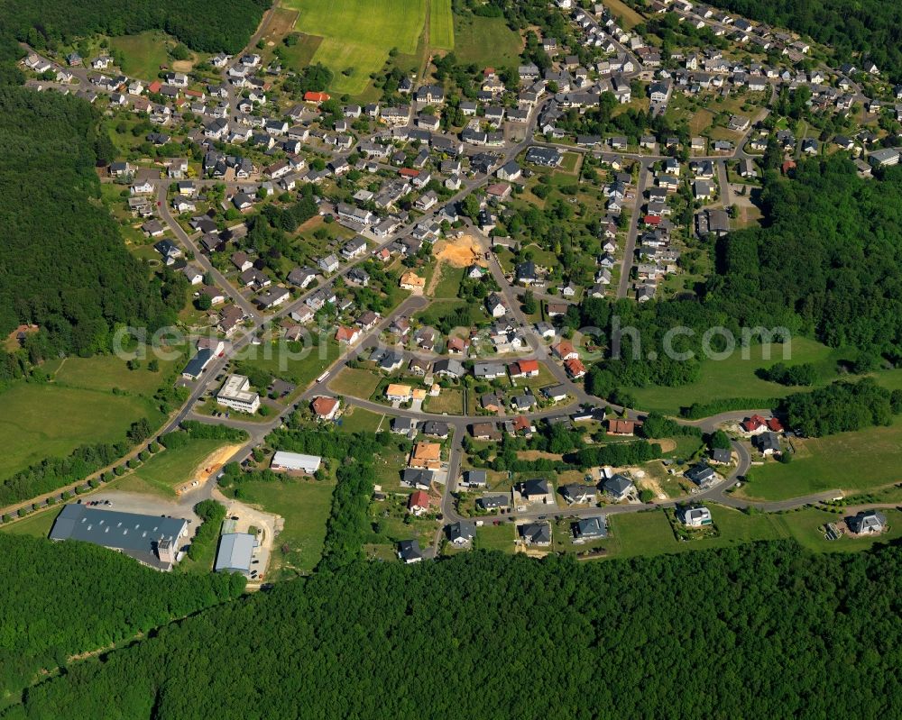 Aerial image Kirschweiler - View of Kirschweiler in the state of Rhineland-Palatinate. The borough and municipiality is an official tourist resort and located in the county district of Birkenfeld, in the Hunsrueck region. It is surrounded by agricultural land, meadows and forest and consists of several hamlets and residential areas