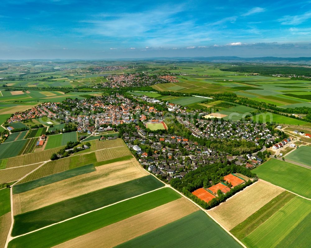 Klein-Winternheim from the bird's eye view: View of the borough of Klein-Winternheim in the state of Rhineland-Palatinate. The wine-growing borough is located in the county district of Mainz-Bingen, on federal motorway A63. The residential village is surrounded by fields, vineyards and meadows