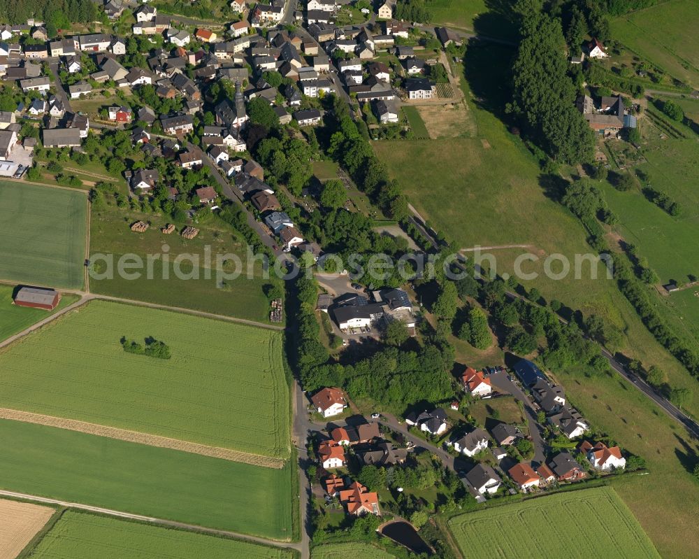 Aerial image Klingelbach - View of the borough of Klingelbach in the state of Rhineland-Palatinate. The borough and municipiality is located in the county district of Rhine-Lahn. The village consists of residential buiildings and areas, sits in the Western Taunus mountain range and is surrounded by meadows and fields