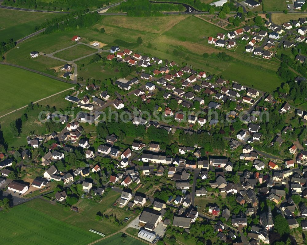 Aerial photograph Klingelbach - View of the borough of Klingelbach in the state of Rhineland-Palatinate. The borough and municipiality is located in the county district of Rhine-Lahn. The village consists of residential buiildings and areas, sits in the Western Taunus mountain range and is surrounded by meadows and fields