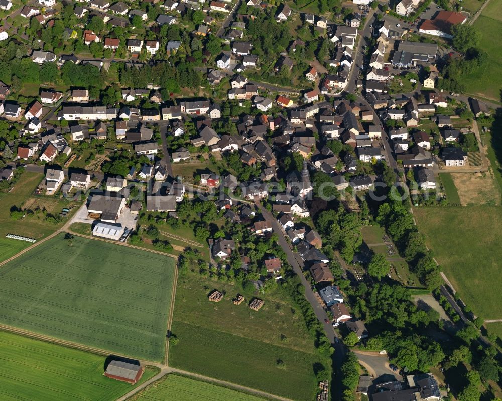 Klingelbach from above - View of the borough of Klingelbach in the state of Rhineland-Palatinate. The borough and municipiality is located in the county district of Rhine-Lahn. The village consists of residential buiildings and areas, sits in the Western Taunus mountain range and is surrounded by meadows and fields