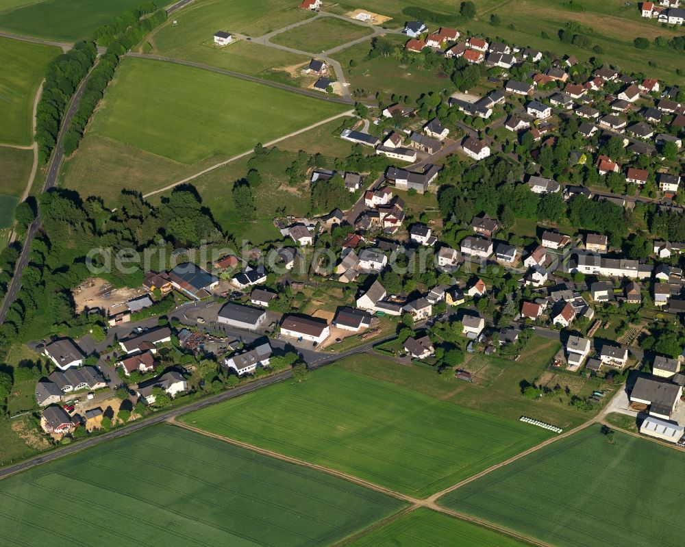 Klingelbach from the bird's eye view: View of the borough of Klingelbach in the state of Rhineland-Palatinate. The borough and municipiality is located in the county district of Rhine-Lahn. The village consists of residential buiildings and areas, sits in the Western Taunus mountain range and is surrounded by meadows and fields