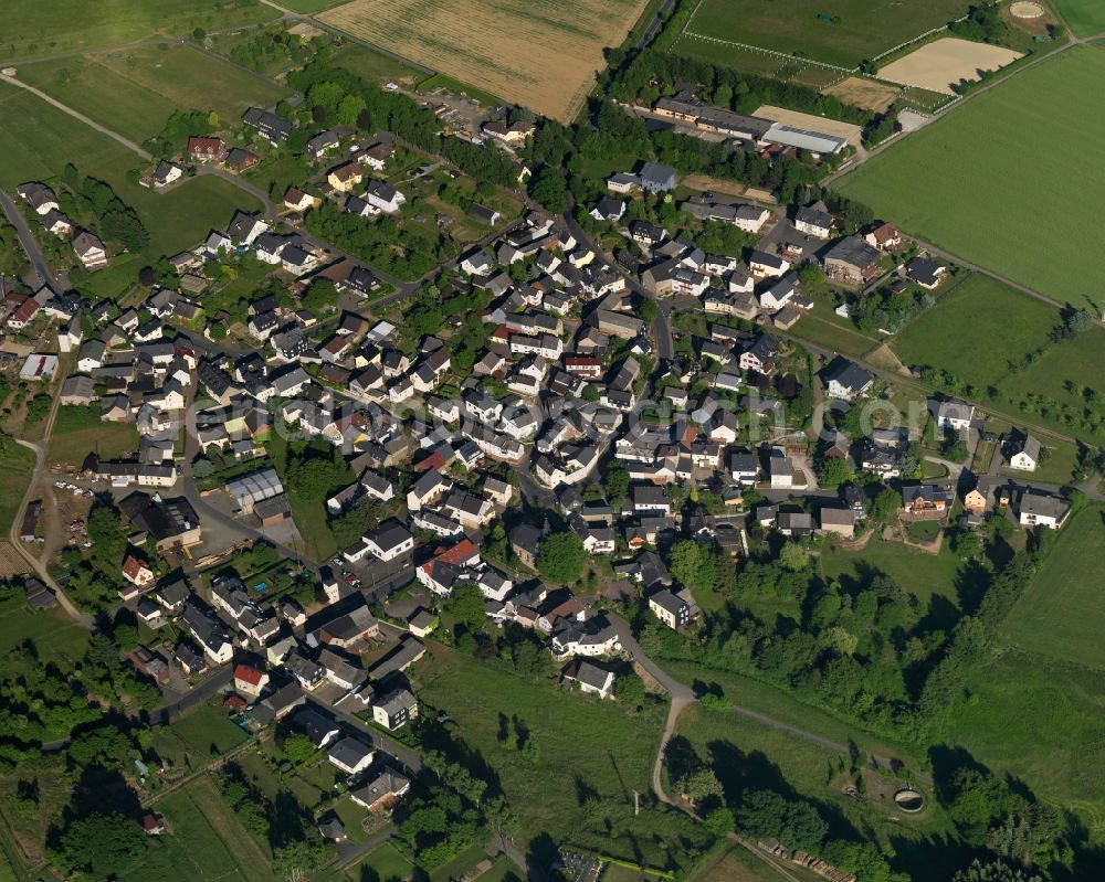 Aerial photograph Kördorf - View of the borough of Koerdorf in the state of Rhineland-Palatinate. The borough and municipiality is located in the county district of Rhine-Lahn. The agricultural village consists of residential buiildings and areas, sits in the Western Taunus mountain range and is surrounded by meadows and fields